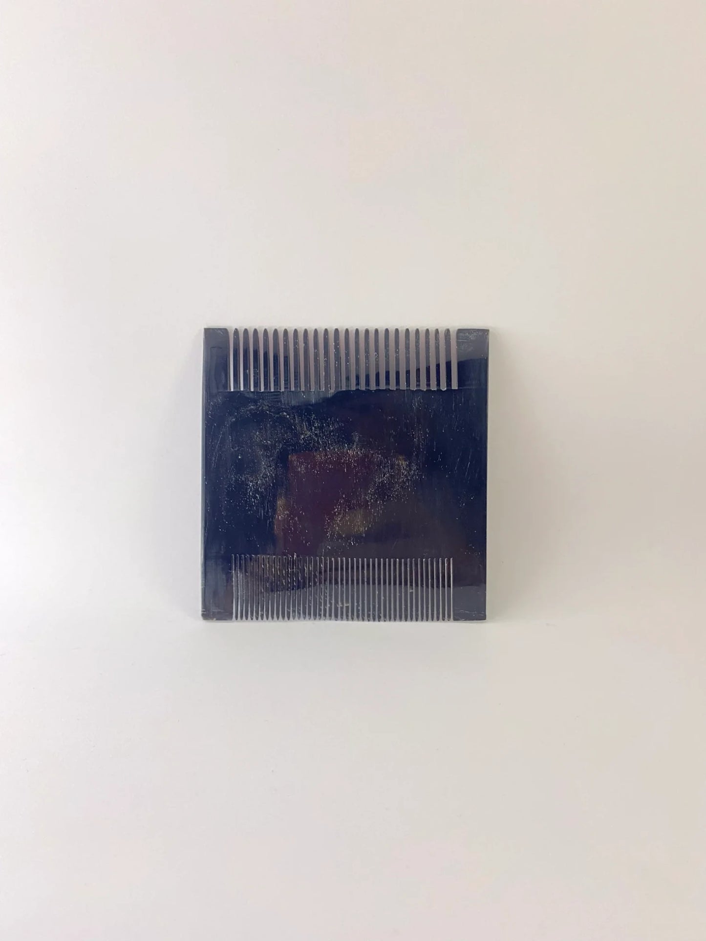 WIDE-TOOTHED BUFFALO HORN